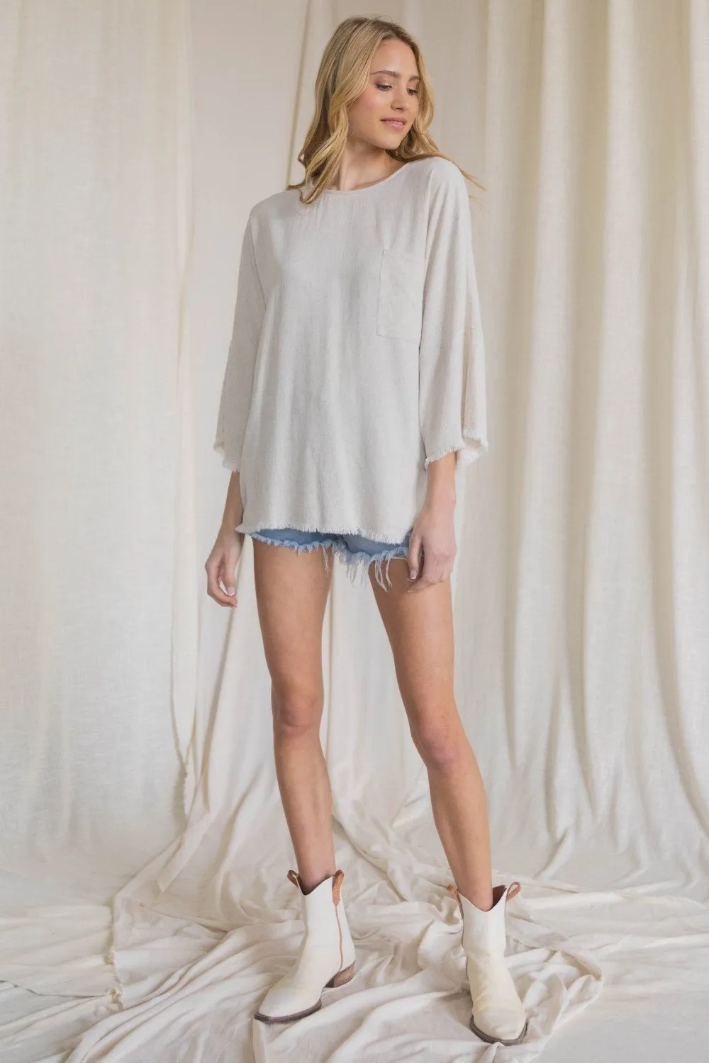 Oversized front pocket linen raw edge top