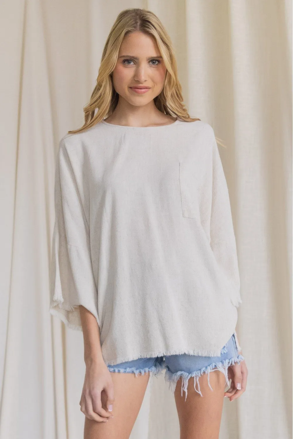 Oversized front pocket linen raw edge top